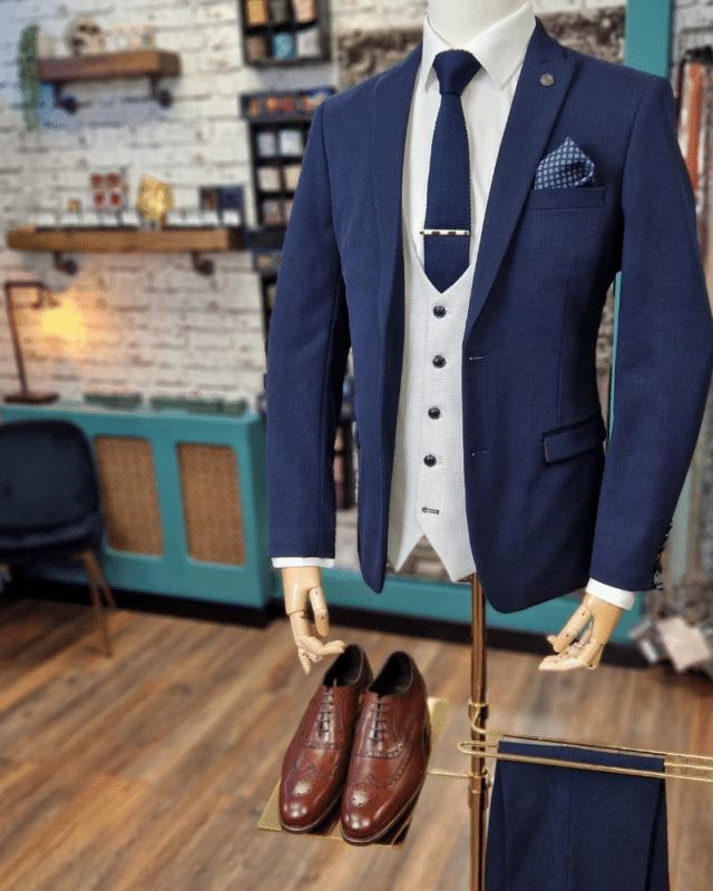 Marc darcy navy bromley blazer and stone waistcoat on a mannequin